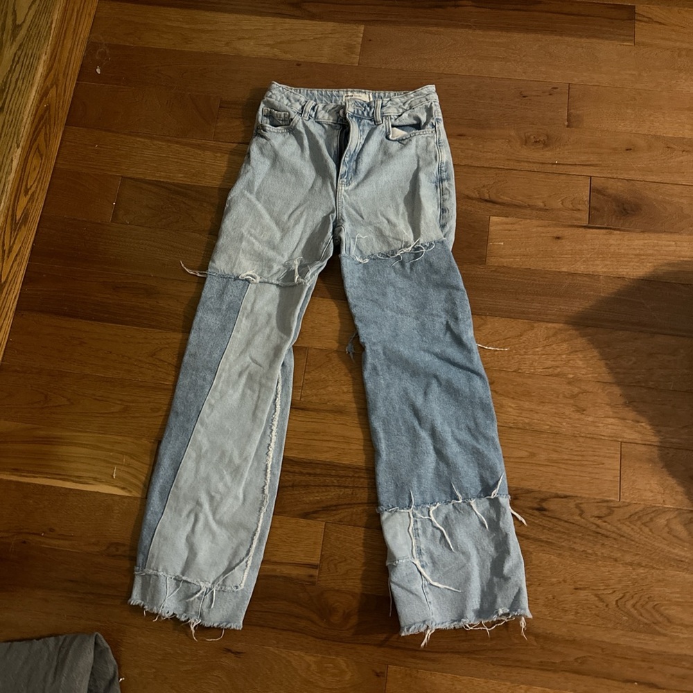 Pair of jeans from Garage, patchwork jeans, wide legged, & size 5 womens